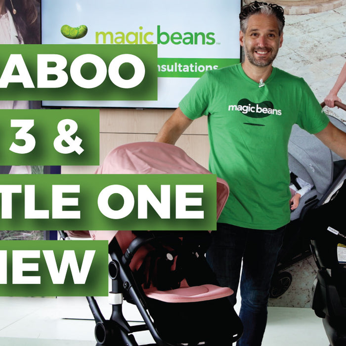 Smiling man stands in a store with the bugaboo fox 3 and bugaboo turtle one car seat beside him