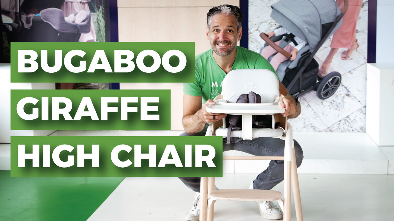 Image of a happy man crouching down by the bugaboo giraffe high chair. Text laid over image reads: bugaboo giraffe high chair.