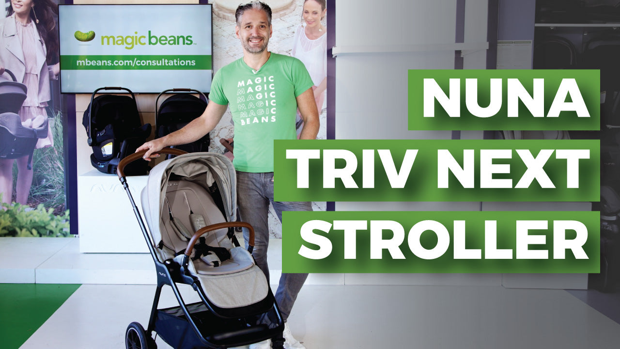Magic Beans owner stands along side the Nuna Triv stroller in grey