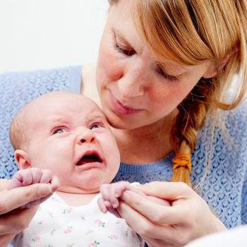 Why are newborn babies fussy at night?