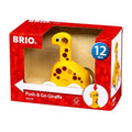 BRIO PUSH AND GO GIRAFFE in its packagin. a red box with white writing. giraffe is yellow with brown circular spots, sweet eyes and low ears.