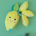 Manhattan Toys Mini-Apple Farm Lemon Take-Along Toy