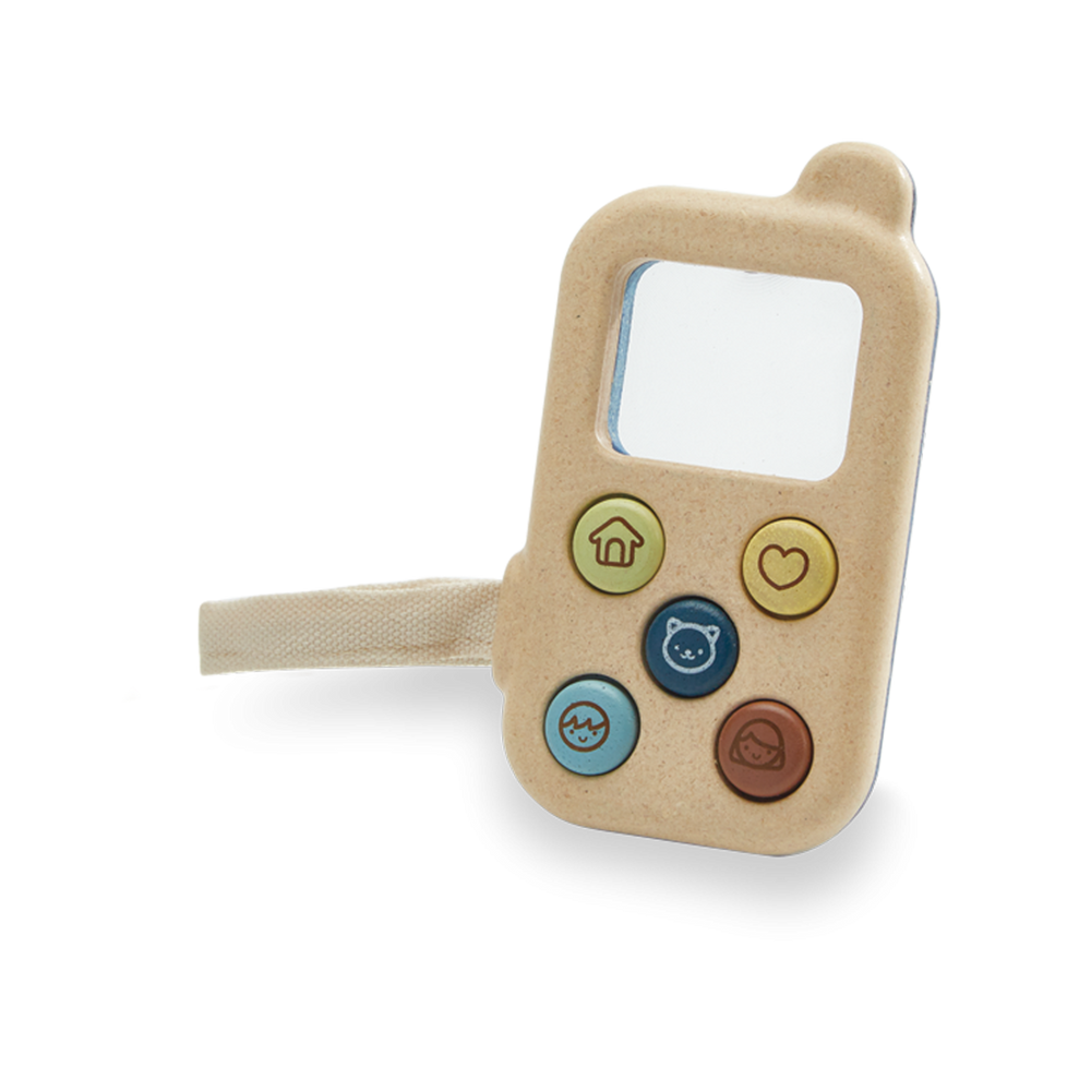 a wood and plastic composite phone. a transparent screen, wrist strap, and 5 colorful buttons. Each button has a picture drawing on it: lime house, yellow heart, navy cat, blue face, red face